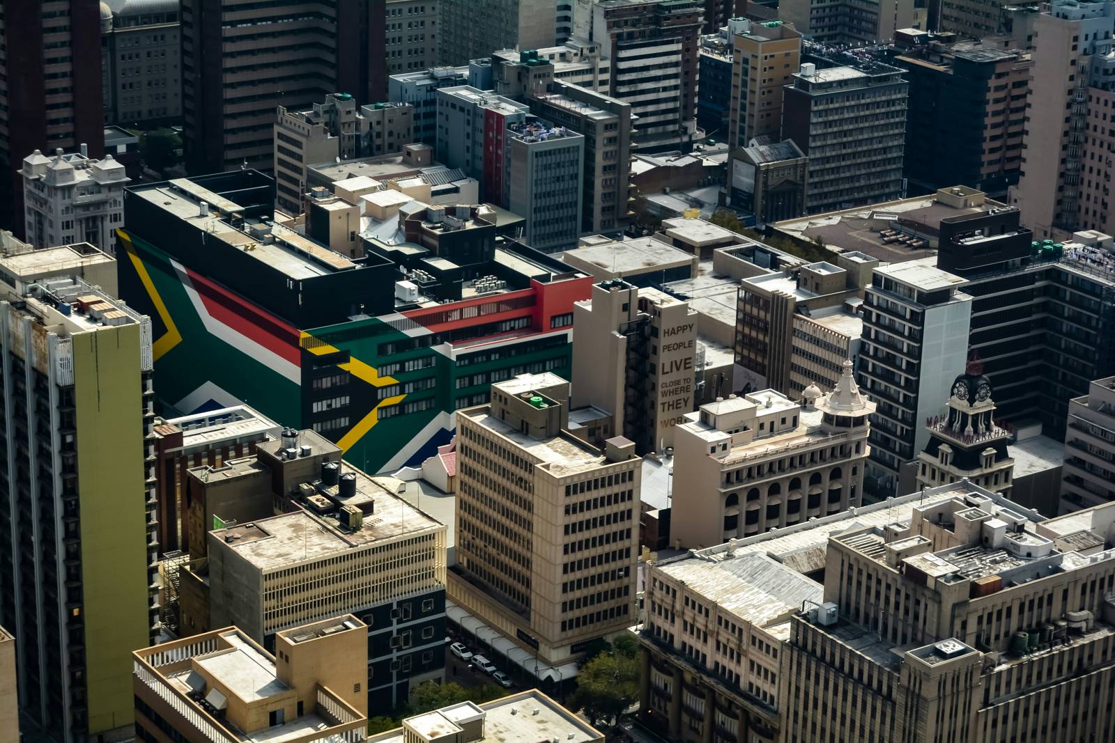 Johannesburg skyline with South African flag